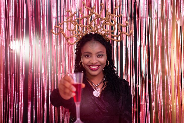 Young woman having fun at costumes party