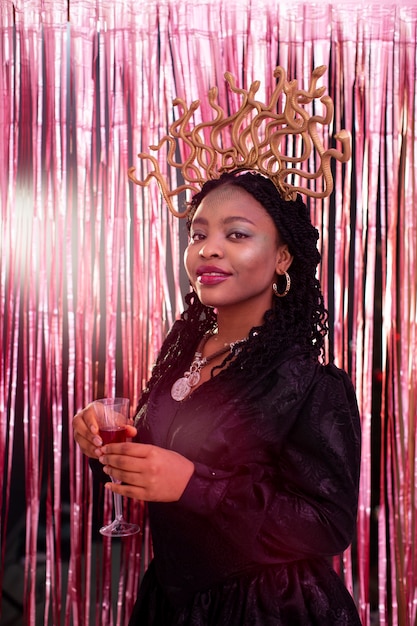 Young woman having fun at costumes party