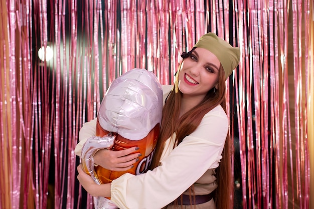 Young woman having fun at costumes party