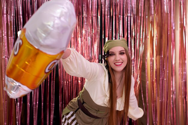 Young woman having fun at costumes party