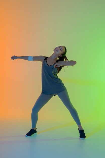 Young woman having fun at zumba