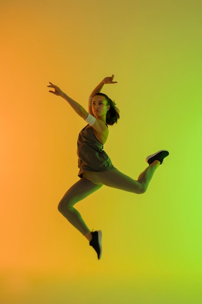 Young woman having fun at zumba