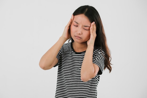 Young woman having a headache 