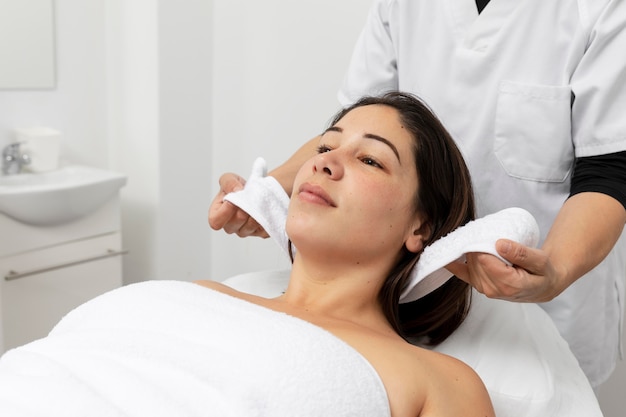 Young woman having a treatment at a beauty salon