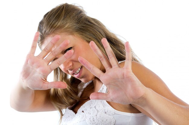 young woman hiding from the camera