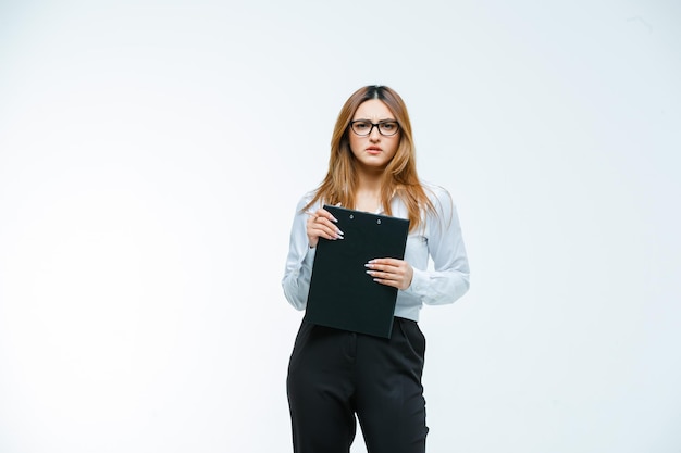 Young woman holding clipboard