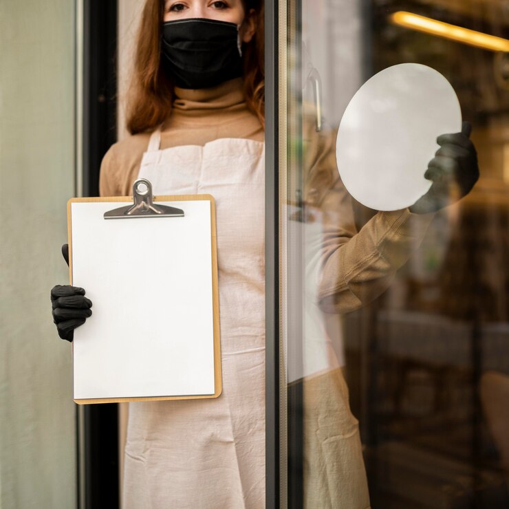 Free Photo young woman holding menu