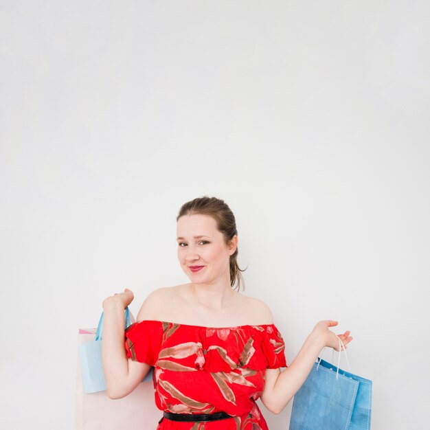 Young woman holding shopping bags