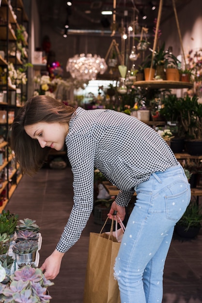 Young woman holding shopping bags