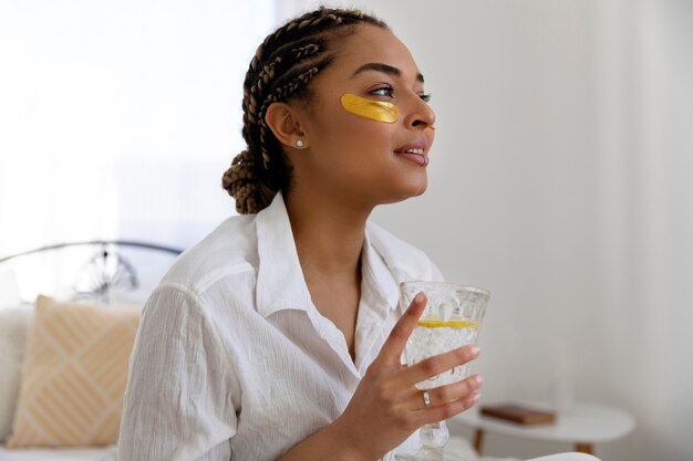 Young woman at home doing her beauty routine