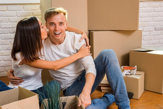 Young woman hugging his boyfriend