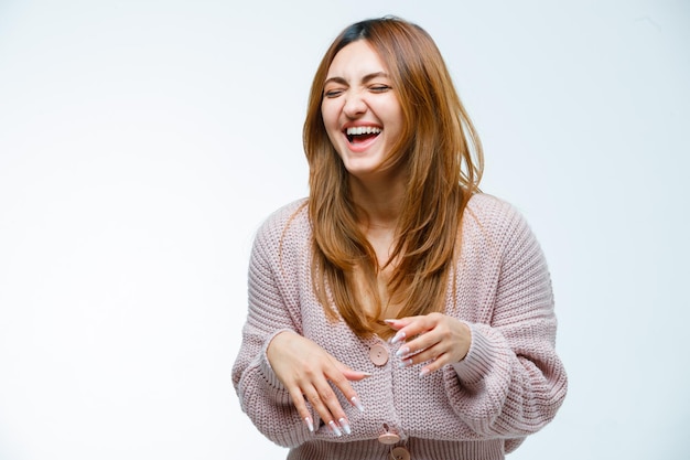 Young woman laughing and looking cheery