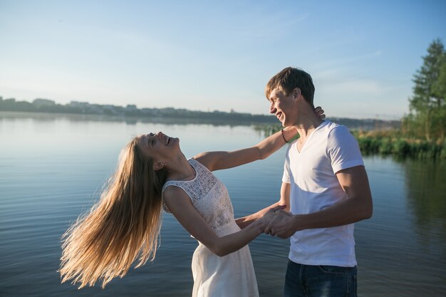 Young woman laughing with her boyfriend