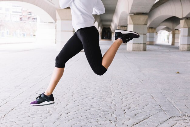 Young woman leaping 