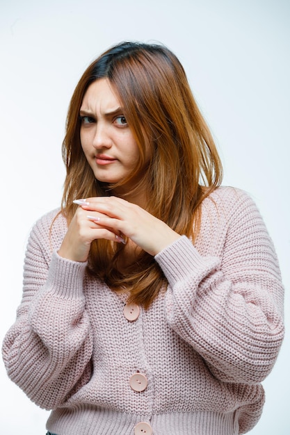 Free photo young woman looking nervous