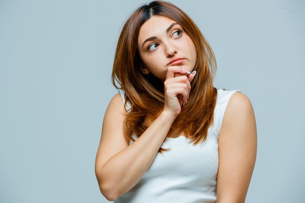 Young woman looking pensive