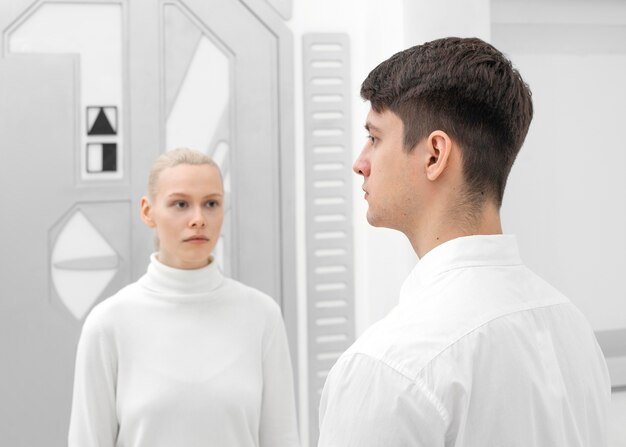 Young woman and man wearing white clothes