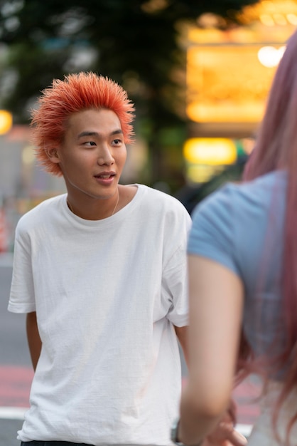 Young woman and man with fun hair colors