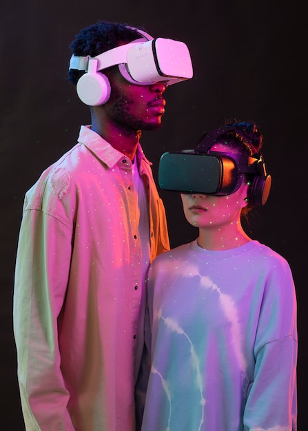 Young woman and man with vr glasses