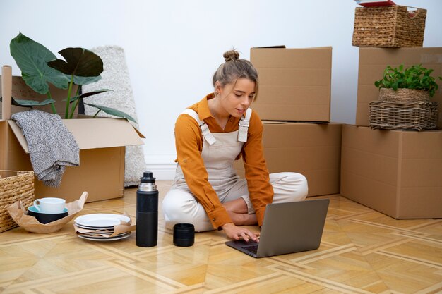 Young woman moving in new home