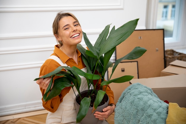 Young woman moving in new home