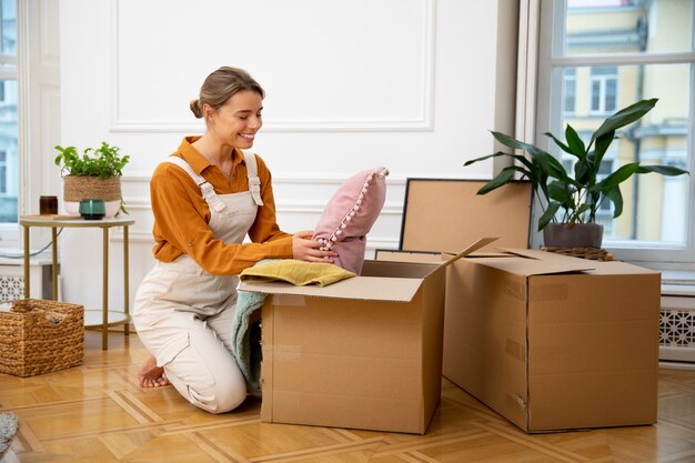 young woman moving in new home