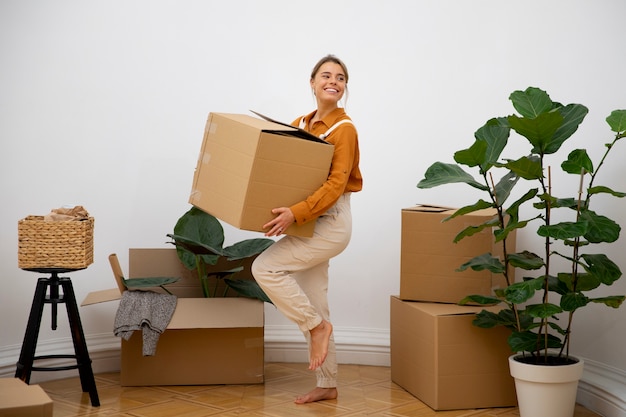 Young woman moving in new home