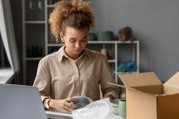 Young woman organizing live shop