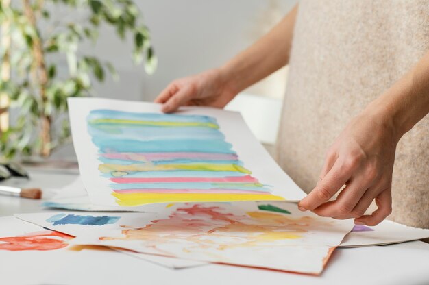 Young woman painting with watercolors