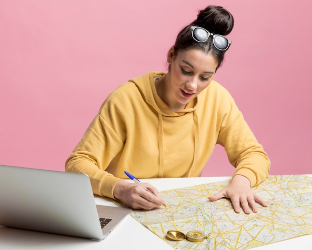 Young woman planning a new adventure