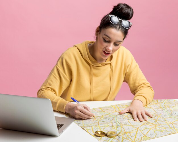 Young woman planning a new adventure