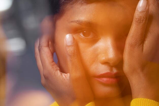 Young woman portrait with overexposed moving style