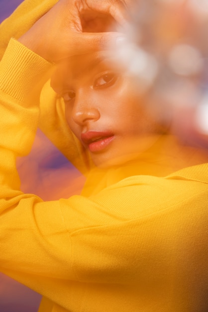 Young woman portrait with overexposed moving style