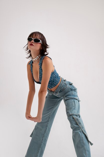 Young woman posing in 2000's fashion style
