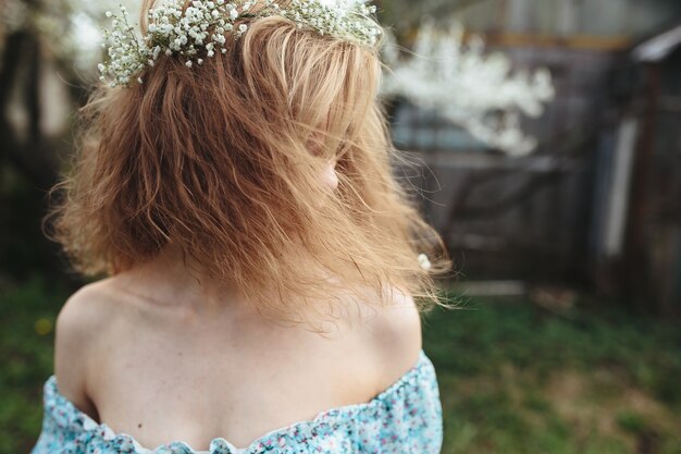 Young woman posing with hair covering her face