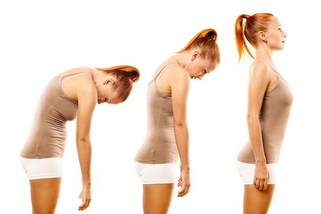 Young woman practicing yoga spine roll