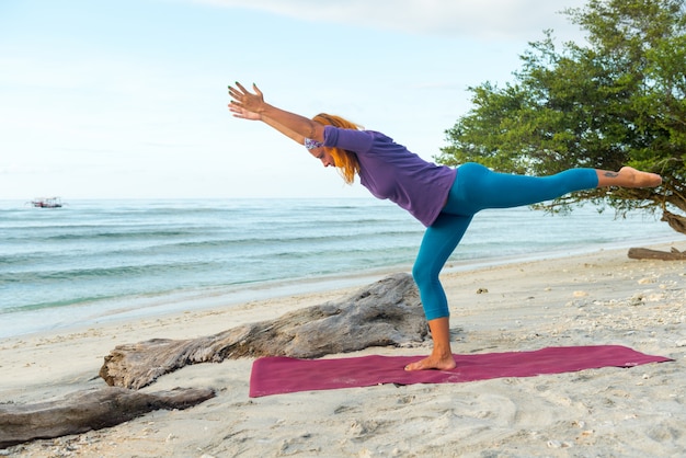 Young woman practicing yoga