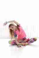 Free photo young woman practicing yoga