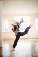 Free photo young woman practising hip hop dance