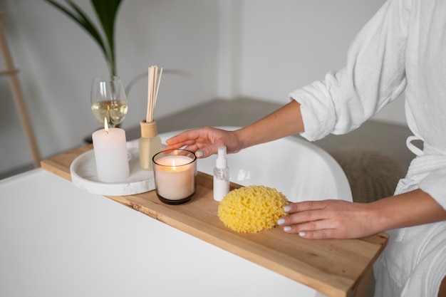 Young woman preparing for her bath time