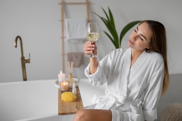 Young woman preparing for her bath time