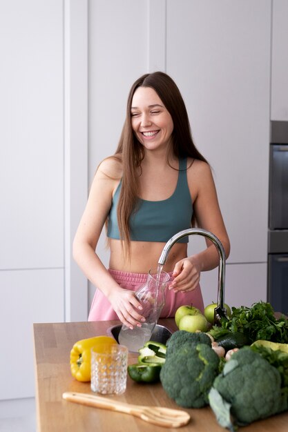 Young woman preparing her nutrition diet