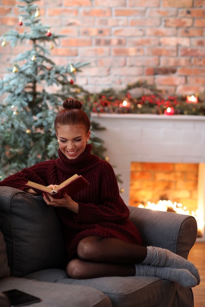 Young woman reading a book