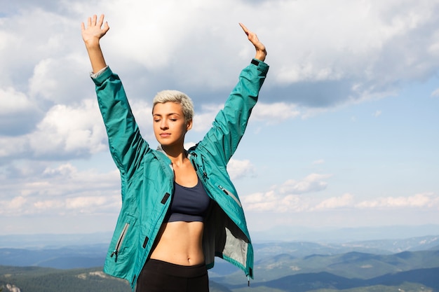 Free photo young woman relaxing in nature