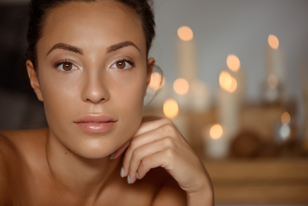 Free photo young woman relaxing in spa salon.