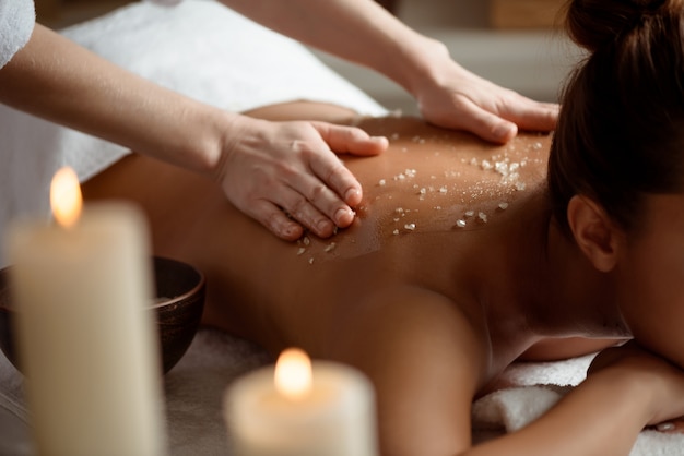 Young woman relaxing in spa salon.