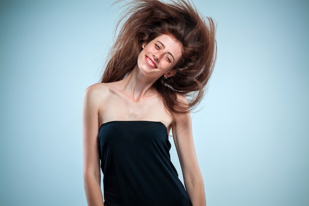 The young woman's portrait with happy emotions