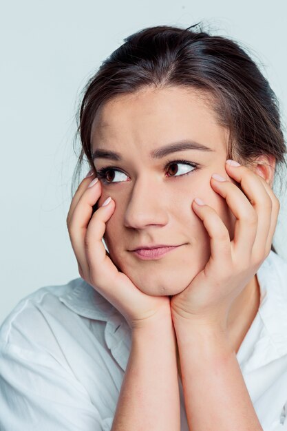 The young woman's portrait with thoughtful emotions