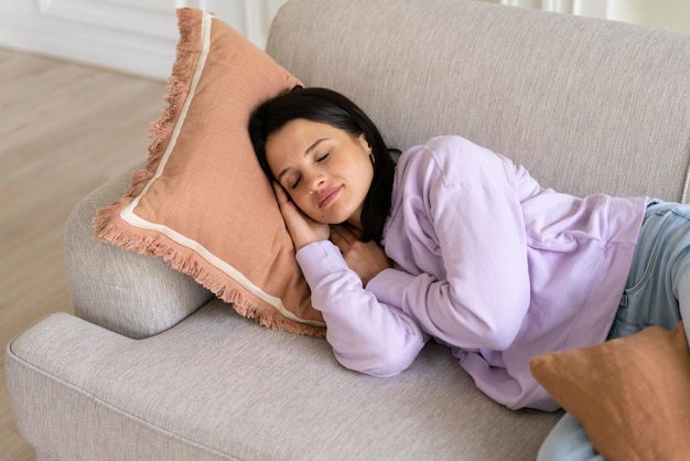 Young woman sleeping at home