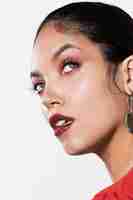 Free photo young woman starring upwards close-up shot